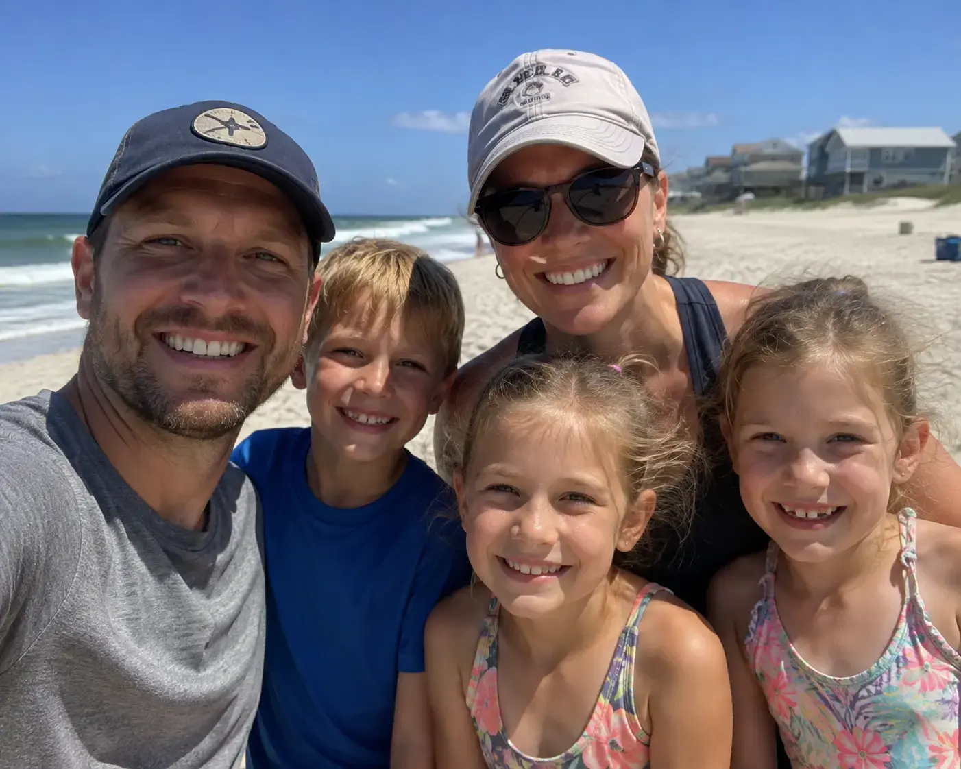 Megan and Ryan Haynes together with their three children.